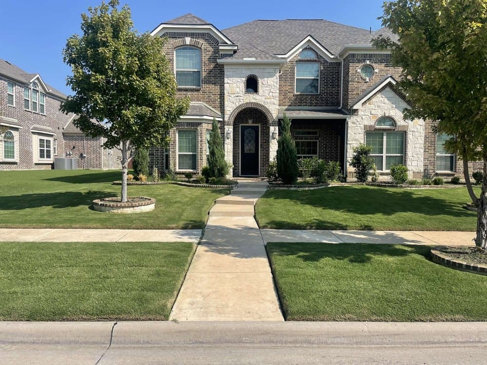 A two-story North DFW property mowed, edged and blown clean on a weekly visit
